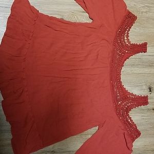 Maurice's rust colored blouse